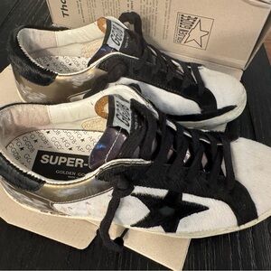 Golden Goose Deluxe Sneakers with Black and Gold Accents